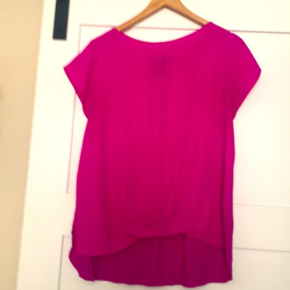 Beautiful Barbie pink blouse.